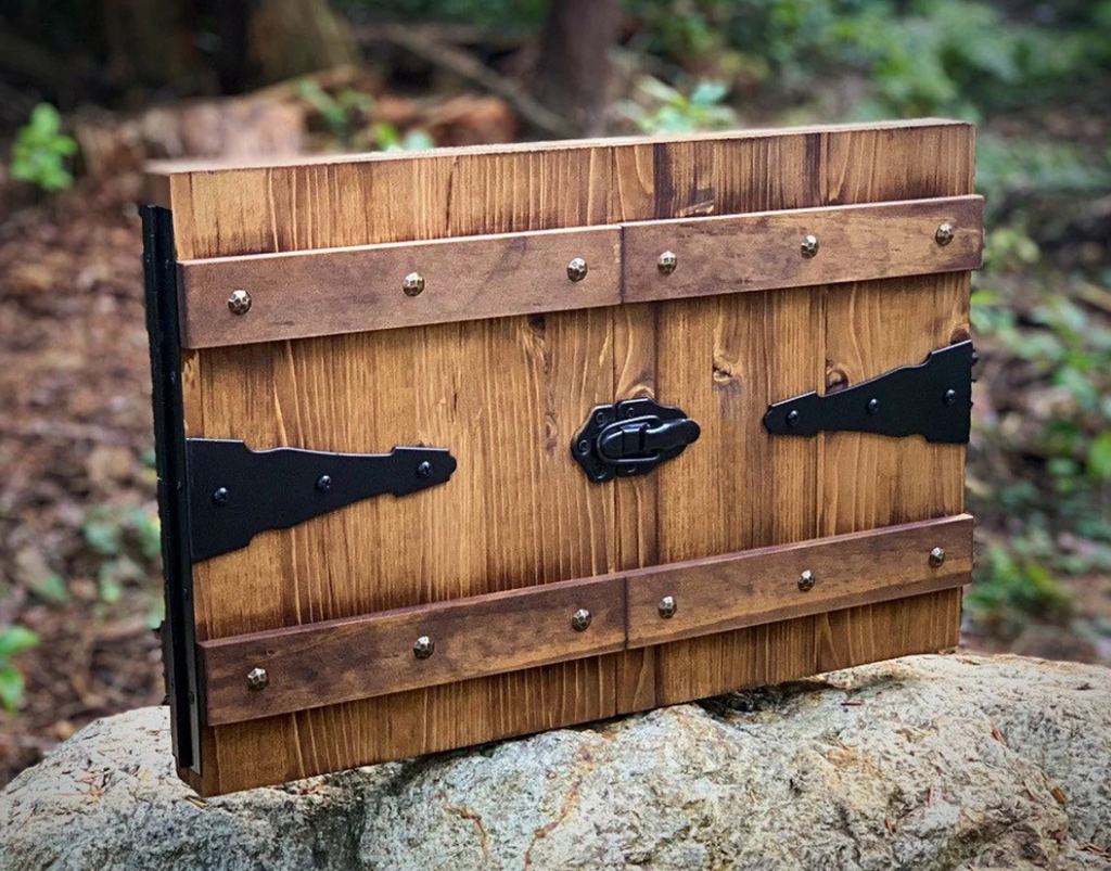 A light stained wooden dungeon master screen