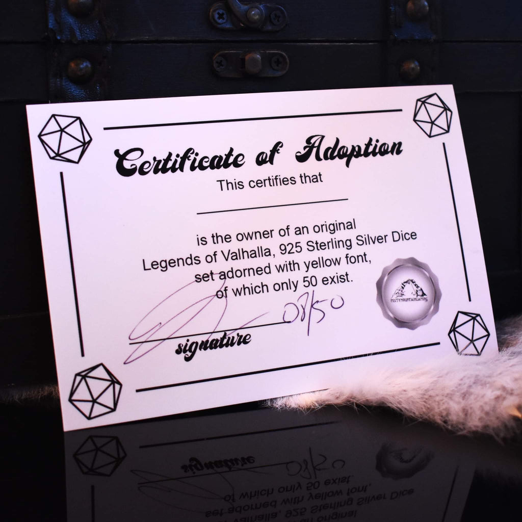 A numbered certificate of adoption for dice set