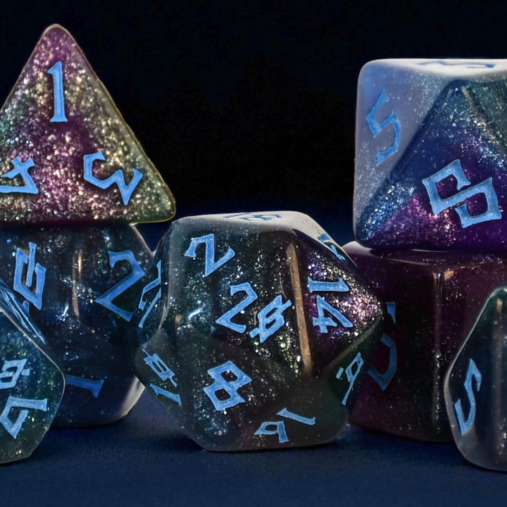 colorful shimmering set of 7 polyhedral acrylic dice with blue numbering
