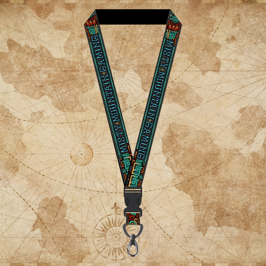 A colorful Aztec-themed lanyard with a map background and a clip at the bottom. The lanyard features various colors and decorative elements.