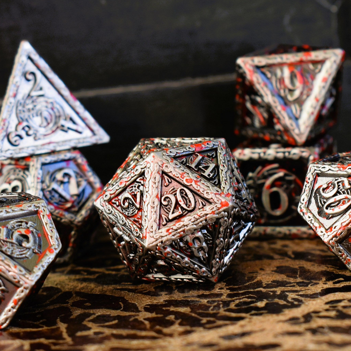 A set of silver metal dice with musical note details around the silver numbers splattered in red blood on a wooden surface, including various shapes such as a d4, d6, d8, d10, d12, and d20.