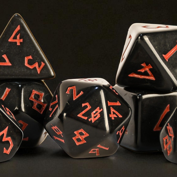 black and orange acrylic polyhedral dice set 
