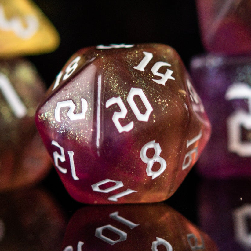 Close-up of a polyhedral dice with numbers on a reflective surface