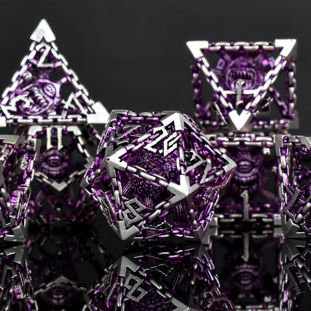 Purple and silver hollow dice with a beholder inside from dungeons and dragons 