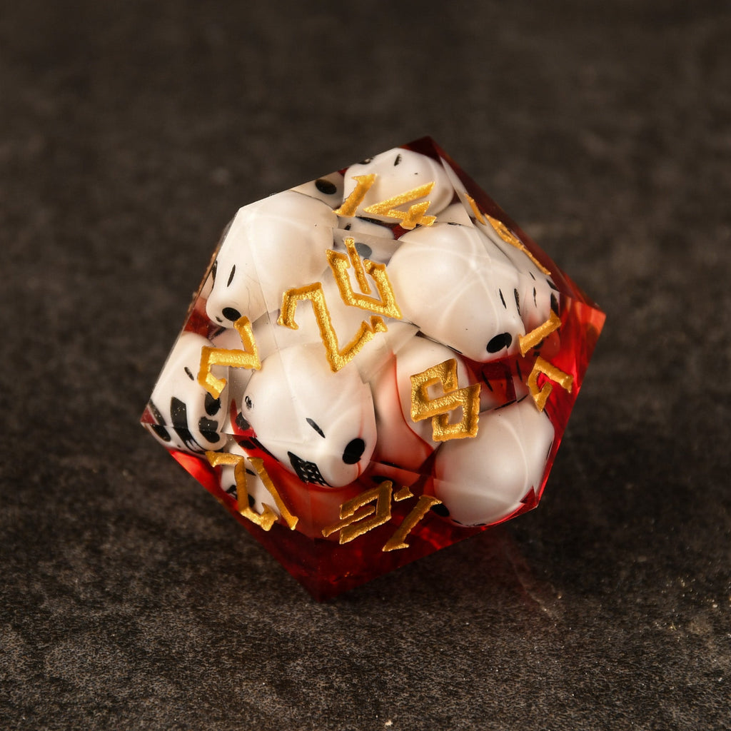 A hand-crafted, sharp-edged resin dice with hand-painted numbers, displayed in a cube shape, surrounded by a dark environment with red tones and flames.