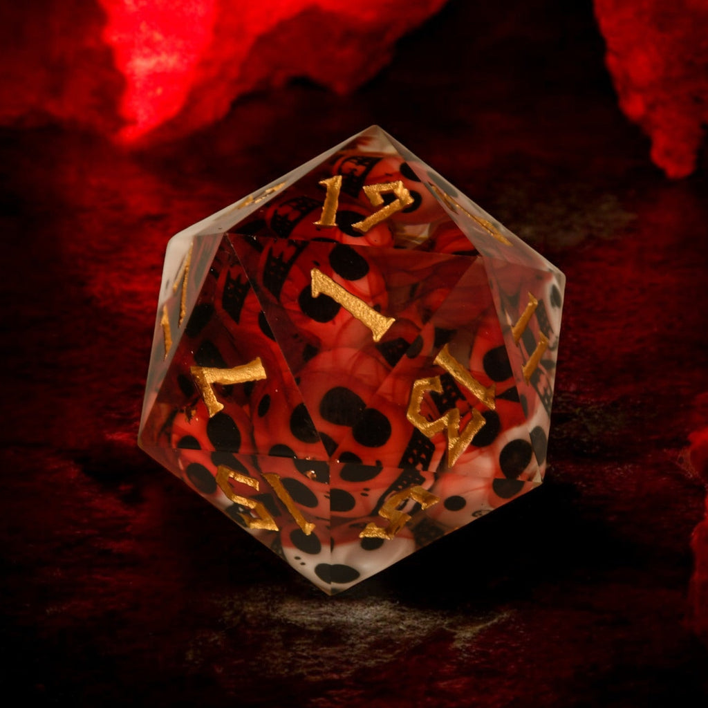 A hand-crafted, sharp-edged resin dice with hand-painted numbers, displayed in a cube shape, surrounded by a dark environment with red tones and flames.