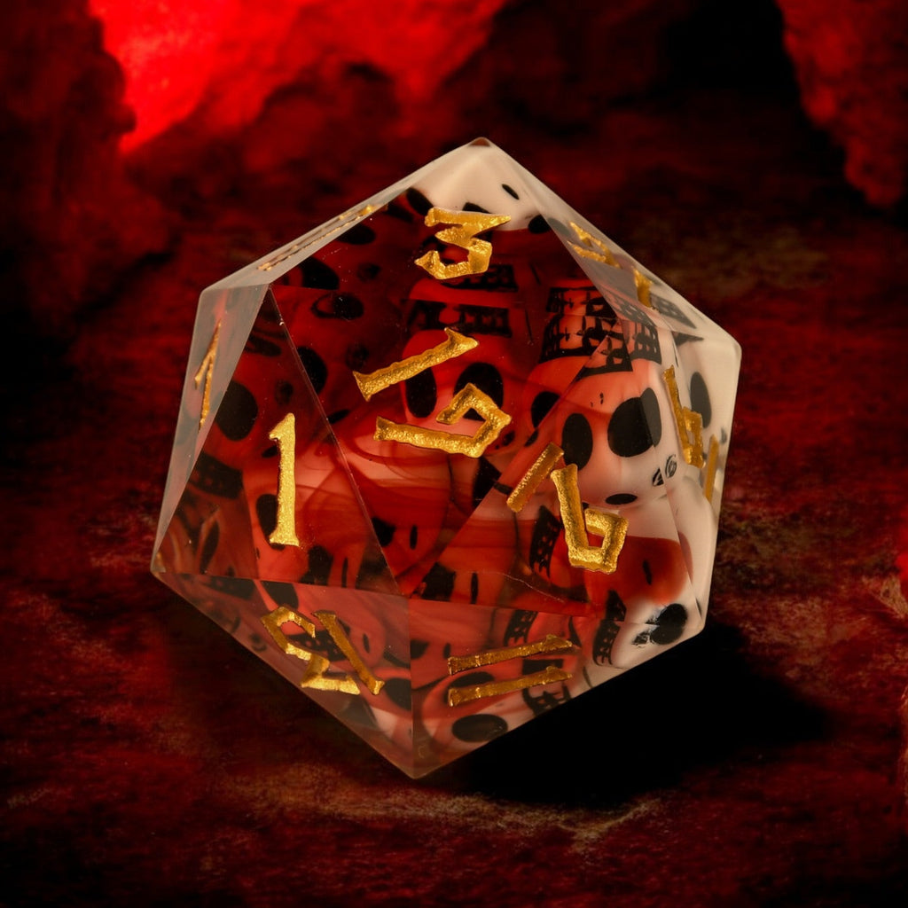 A hand-crafted, sharp-edged resin dice with hand-painted numbers, displayed in a cube shape, surrounded by a dark environment with red tones and flames.