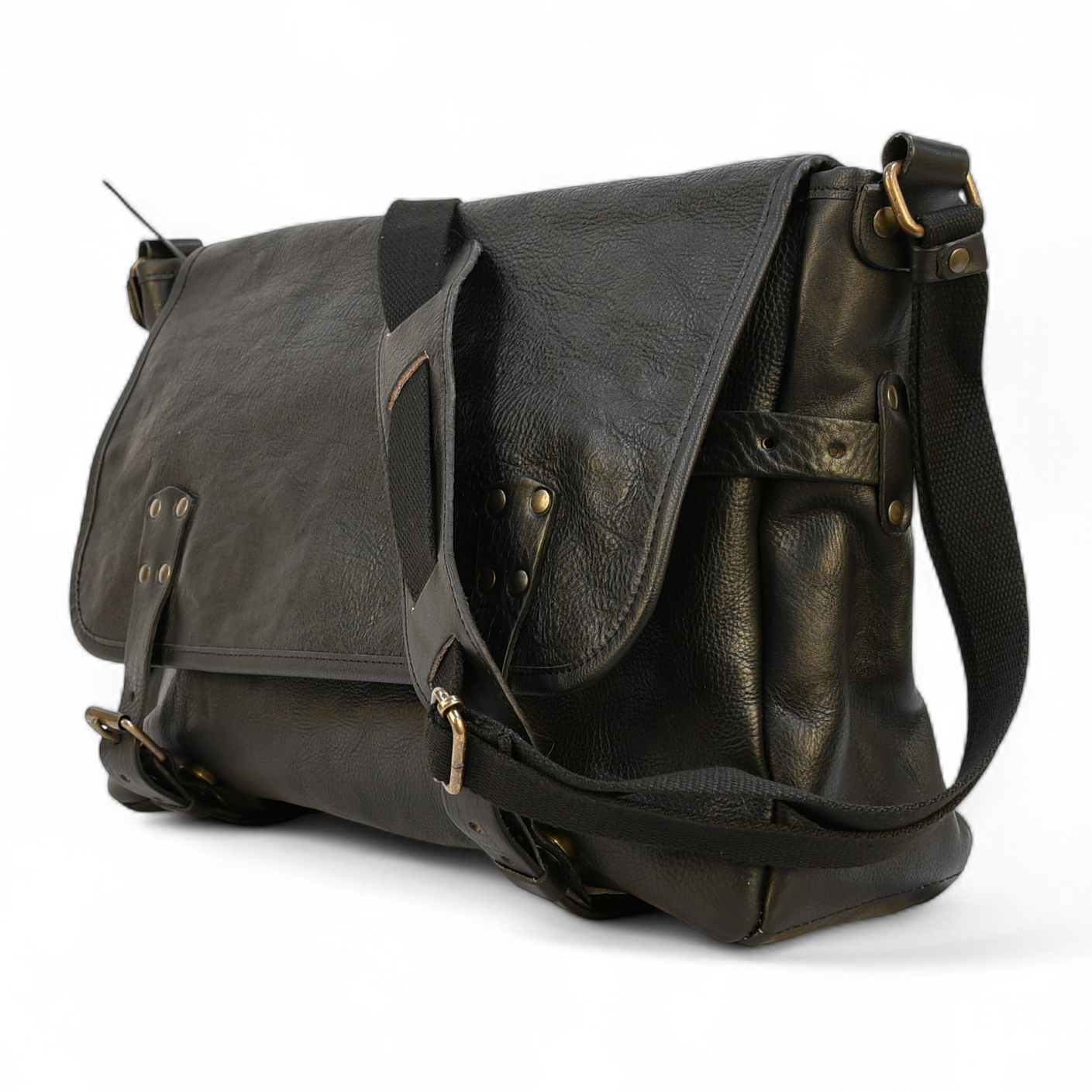 Black leather modern rugged messenger bag on a wooden surface