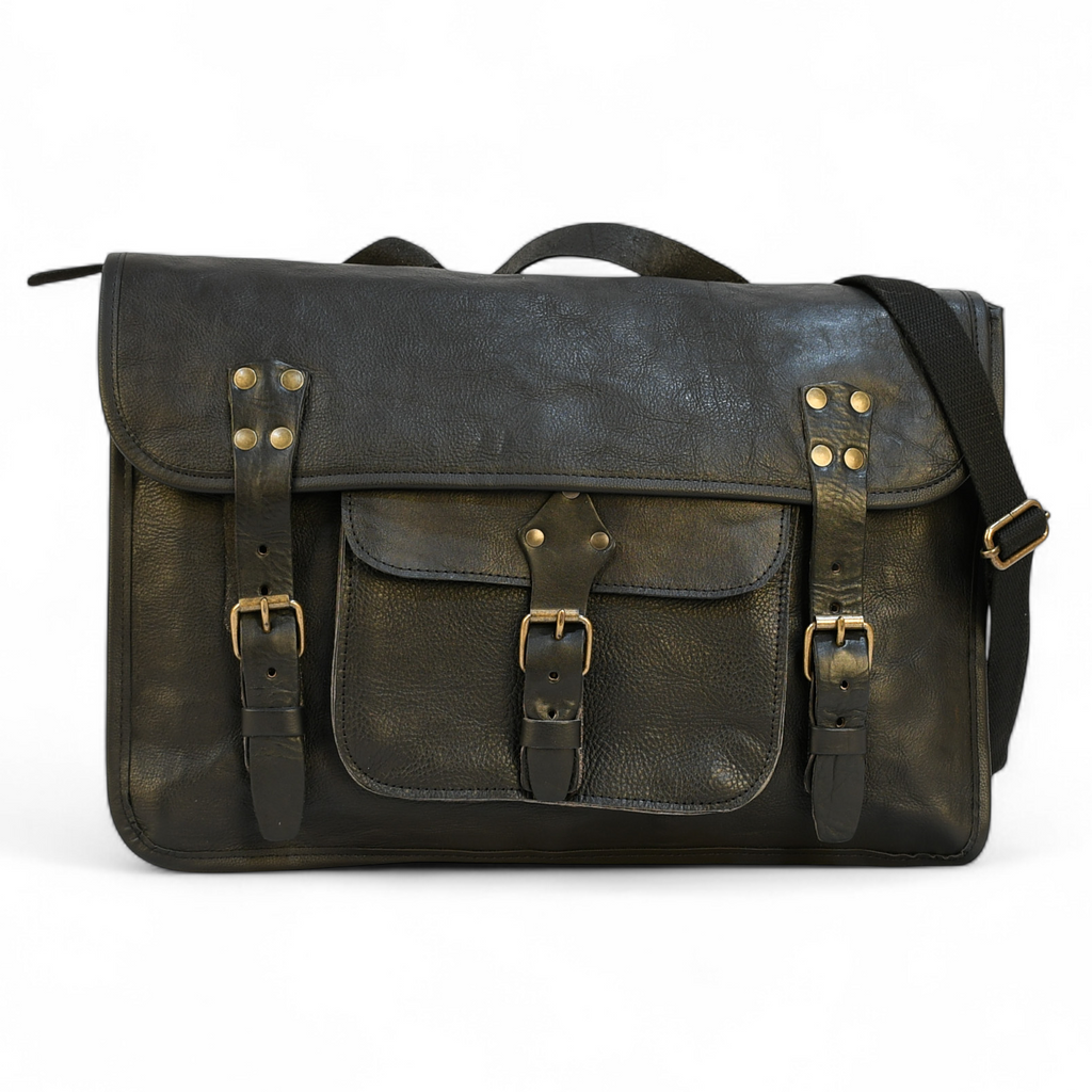 Vintage-style modern rugged leather briefcase bag on a wooden surface with bookshelf in the background