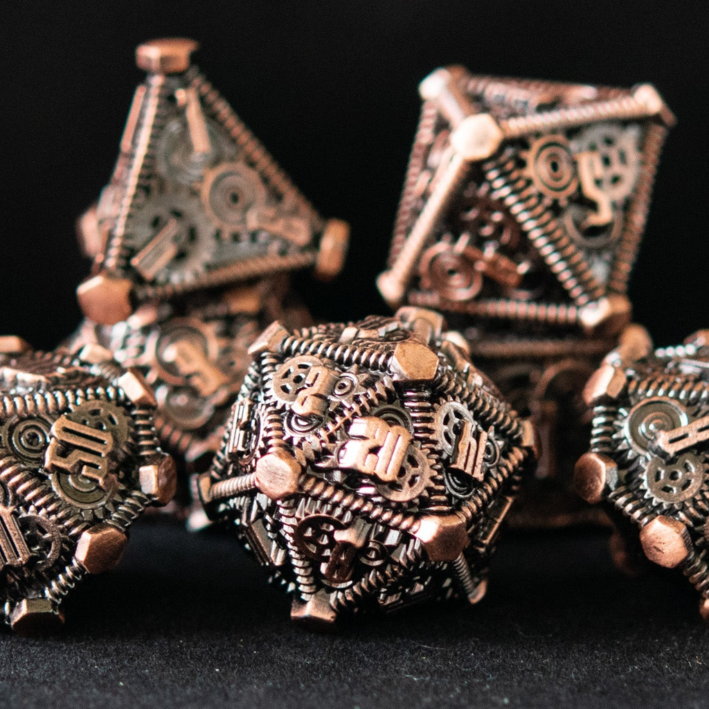 solid metal steampunk inspired dnd polyhedral dicce in bronze with green accents around the gears and numbers