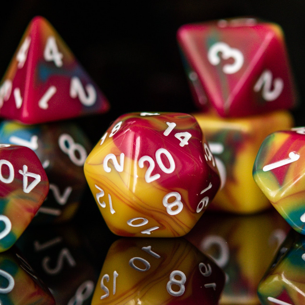 Colorful polyhedral dice on a reflective surface with a dark background