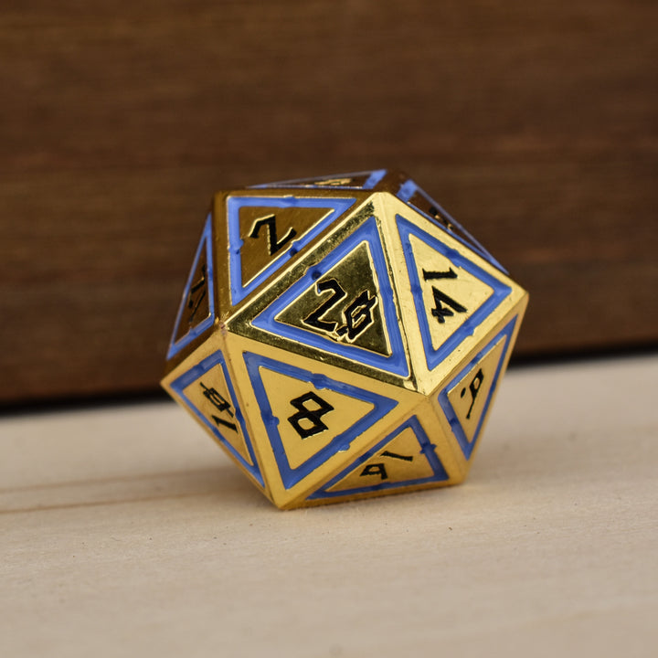 gold polyhedral dnd dice with blue borders on each face and black numbering