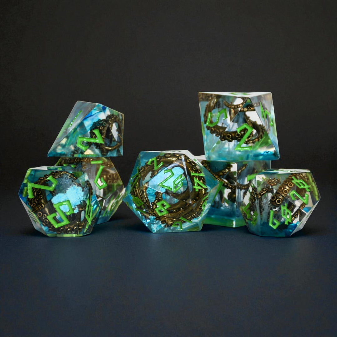 clear resin dice set with blue inside and bronze cthulhu tentacles with green numbering for dnd ttrpg