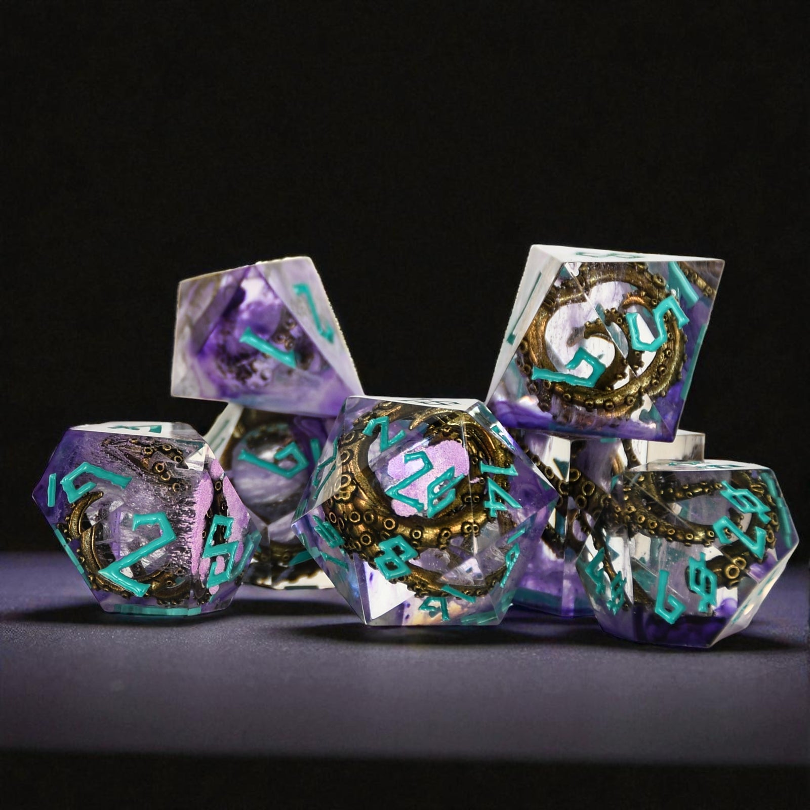 Set of purple dice with teal numbers and bronze cthulhu tentacles inside on a black background