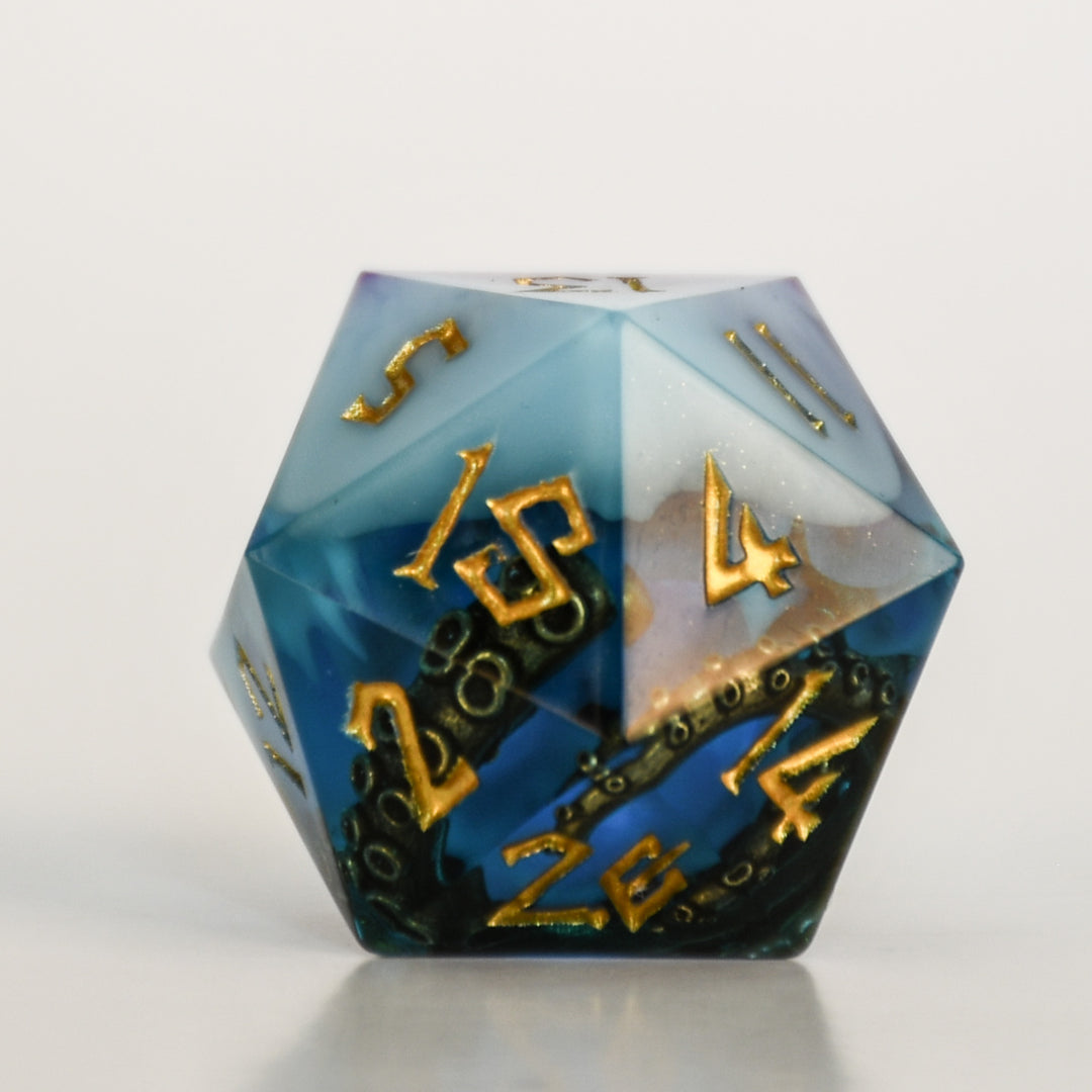 Blue and purple sharp edge resin dnd dice with bronze cthulhu tentacles inside and gold numbering