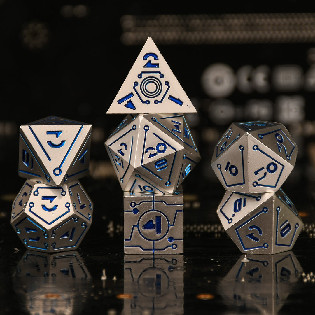 a set of matte silver cyberpunk inspired metal dnd dice with blue numbering and detail on a blurry computer chip inspired background