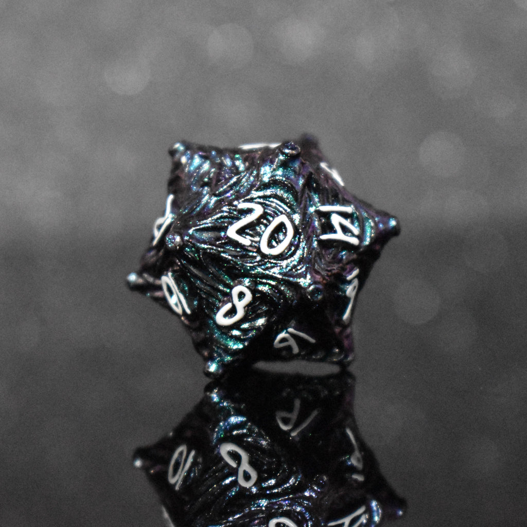 Iridescent galaxy vortex metal D20 featuring white font numbers
