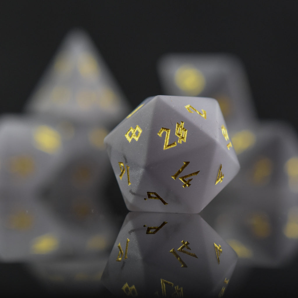 Frosted grey cat's eye stone dice set with golden nordic font