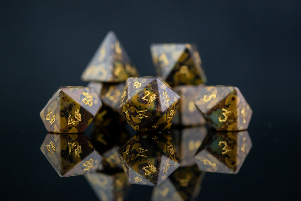 Green, brown, and yellow multi-colored ajooba jasper stone dice set with gold nordic font numbers