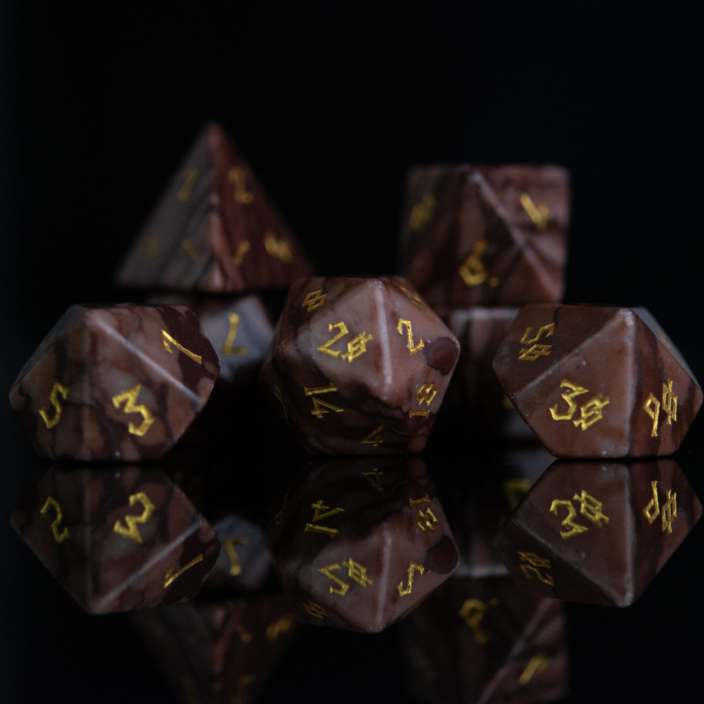 Brown desert jasper stone dice set with gold nordic font numbers