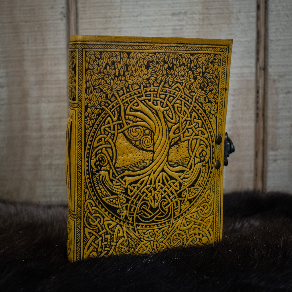 A yellow journal featuring the tree of life