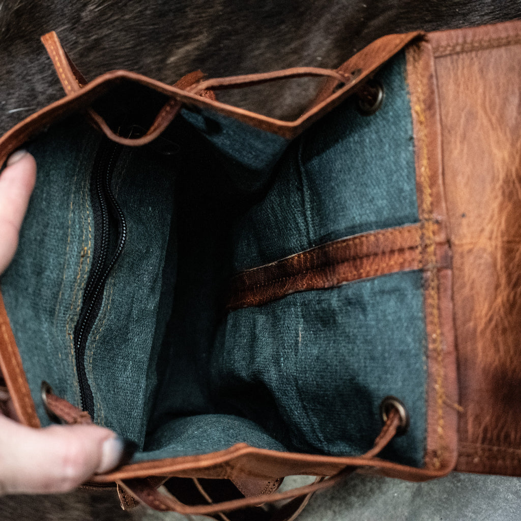 Inside of brown leather mini backpack