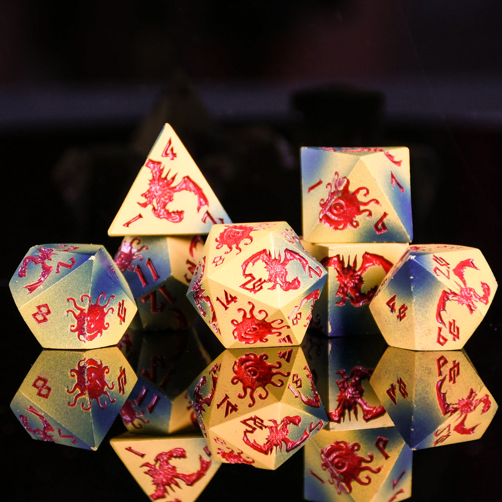 Set of polyhedral dice with red and blue designs on a reflective surface