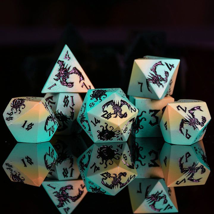 Set of glowing polyhedral dice with scorpion design on a dark background