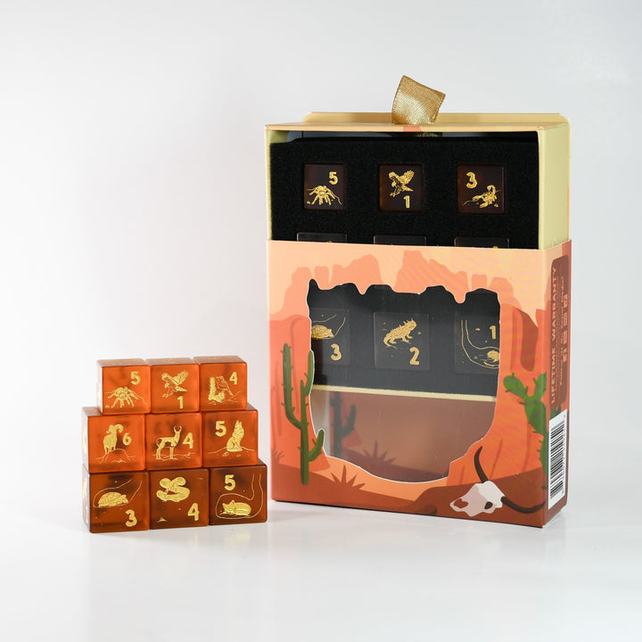 Set of wooden blocks with animal illustrations and numbers, next to their packaging.