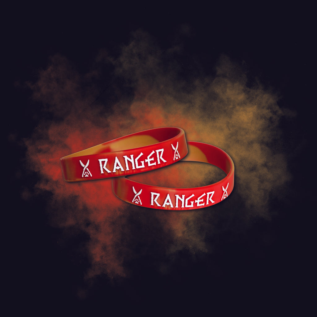 Two red 'Ranger' wristbands on a dark background with smoke effect