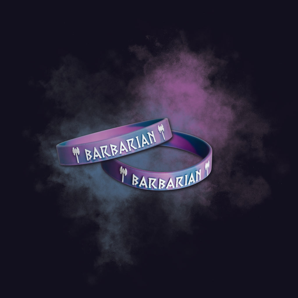 Two purple 'Barbarian' wristbands with smoke effect on a black background
