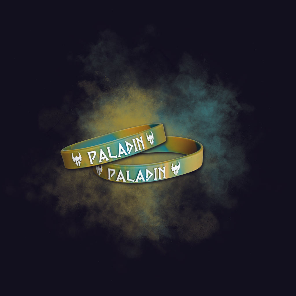 Two green wristbands with 'Paladin' branding on a dark background with colorful smoke effects.