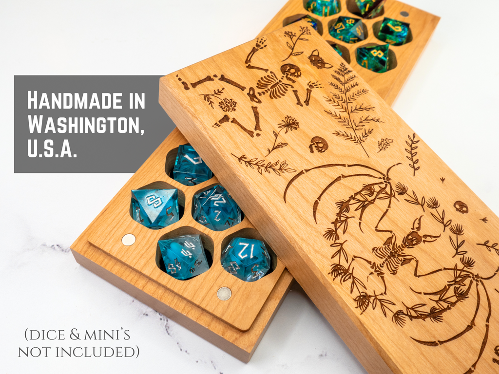 Wooden dice box with engraved designs on a white background, featuring 'Handmade in Washington, U.S.A.' text.