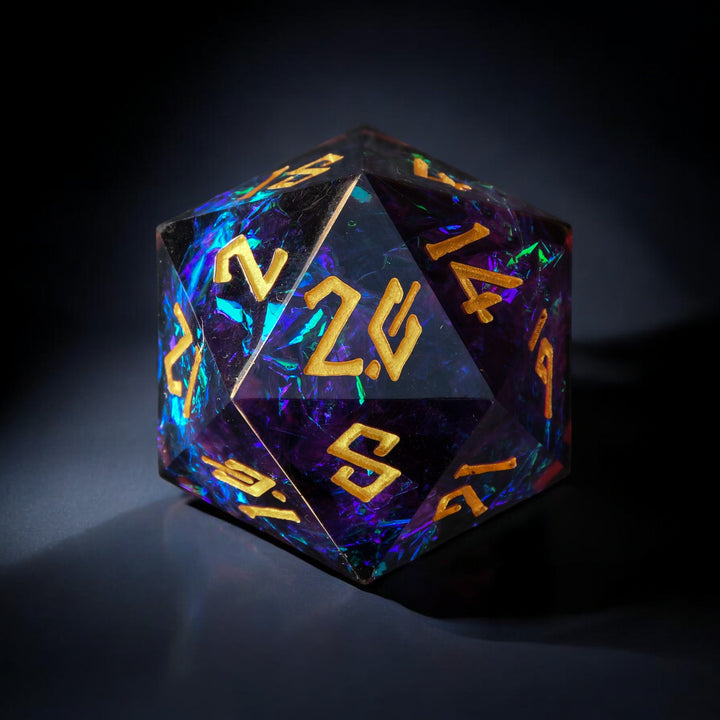 A hand-crafted, sharp-edged resin dice with hand-painted numbers, featuring a black color with purple and gold accents, illuminated by a spotlight.