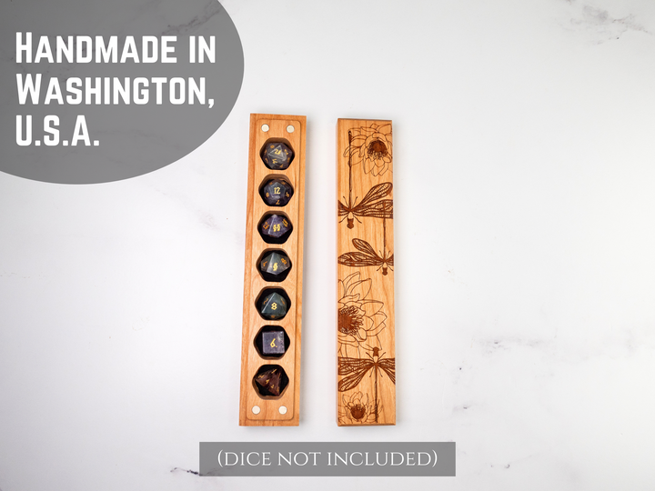 Wooden dice vault stands with engraved designs on a light gray background, labeled &