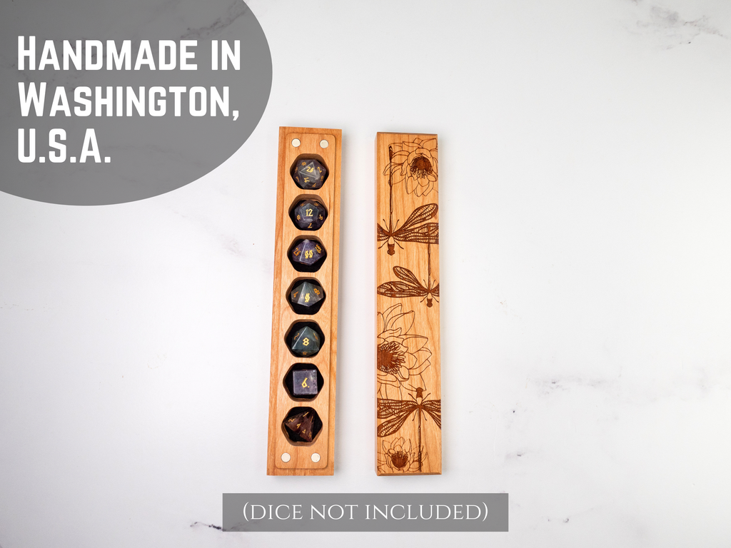 Wooden dice vault stands with engraved designs on a light gray background, labeled 'Handmade in Washington, U.S.A.'