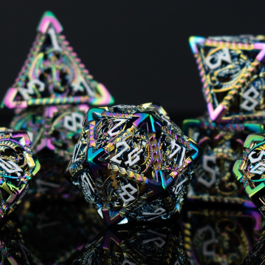 Multicolored polyhedral dice set on a reflective surface with a dark background