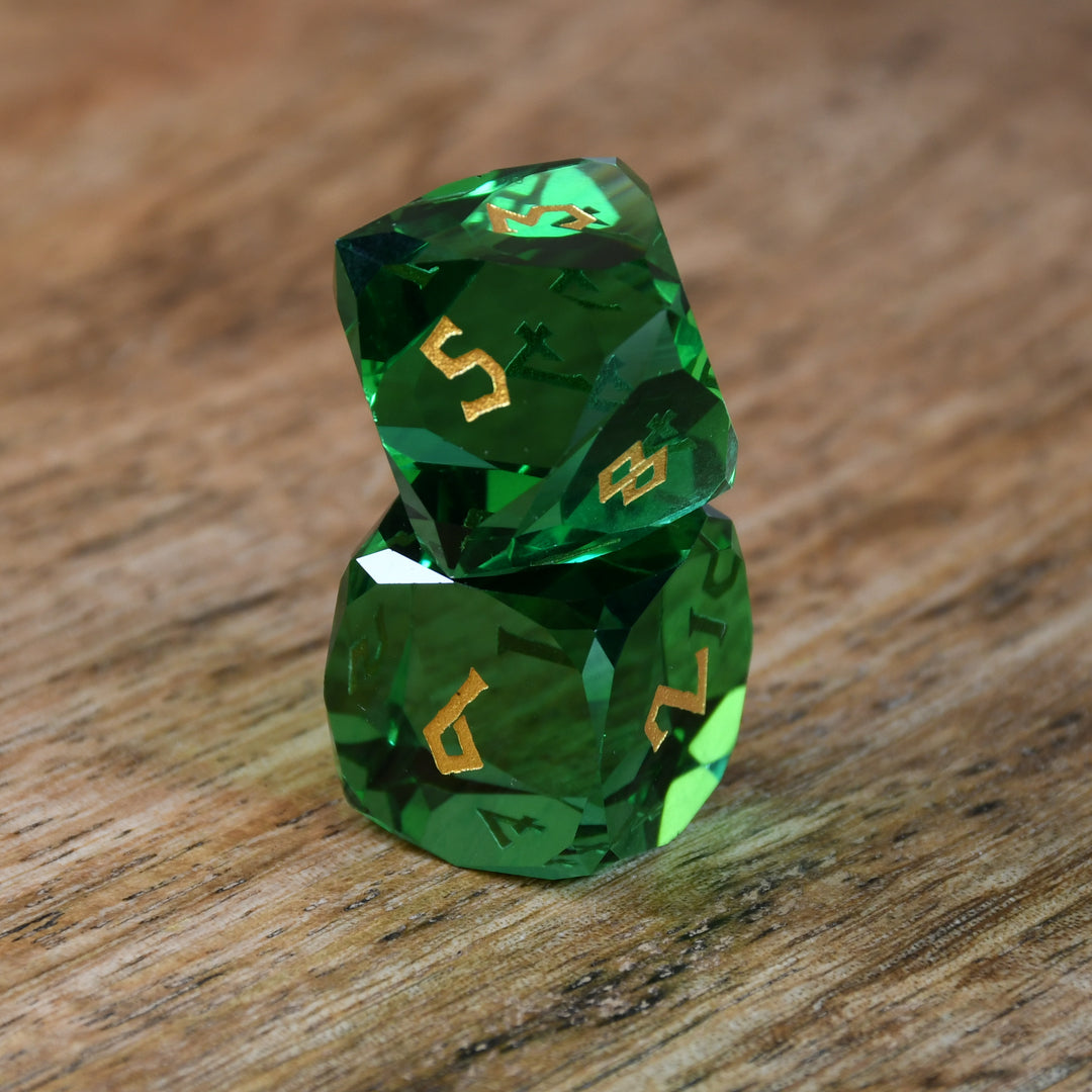 Emerald Multifaceted Glass Dice with gold numbering for dnd and ttrpg