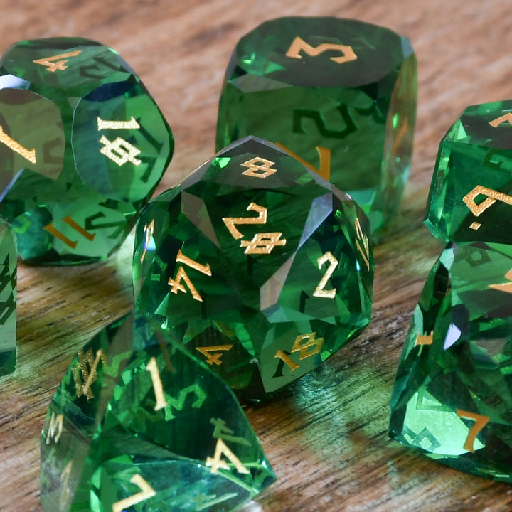 Emerald Multifaceted Glass Dice with gold numbering for dnd and ttrpg