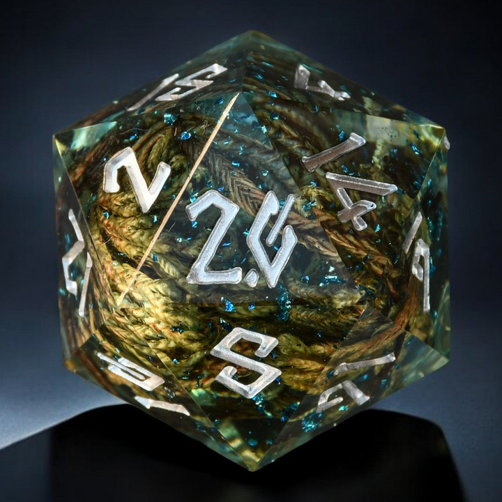 A hand-crafted clear resin dice with hand-painted numbers, shaped as a d20, with an enchanted lake appearance.