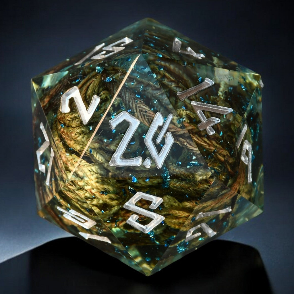 A hand-crafted clear resin dice with hand-painted numbers, shaped as a d20, with an enchanted lake appearance.