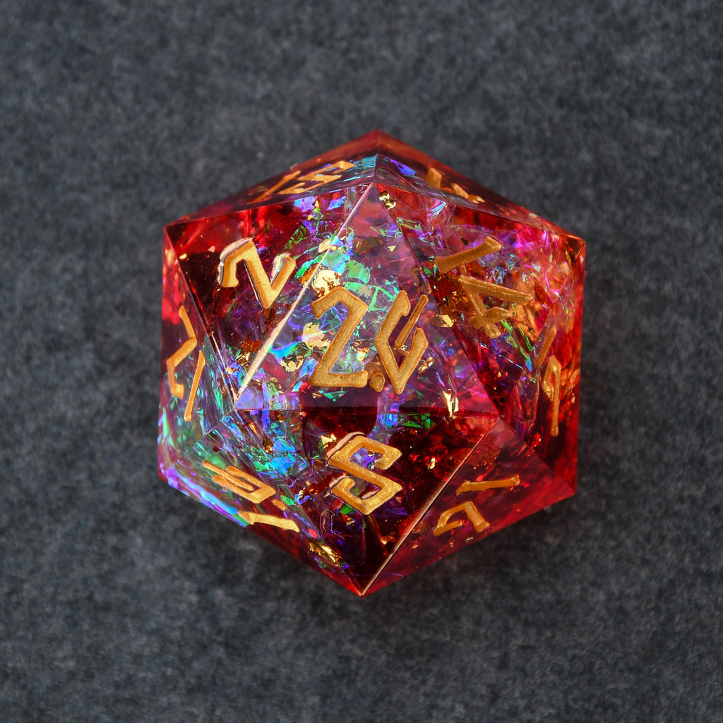 Multicolored d20 die with gold numbers on a dark background