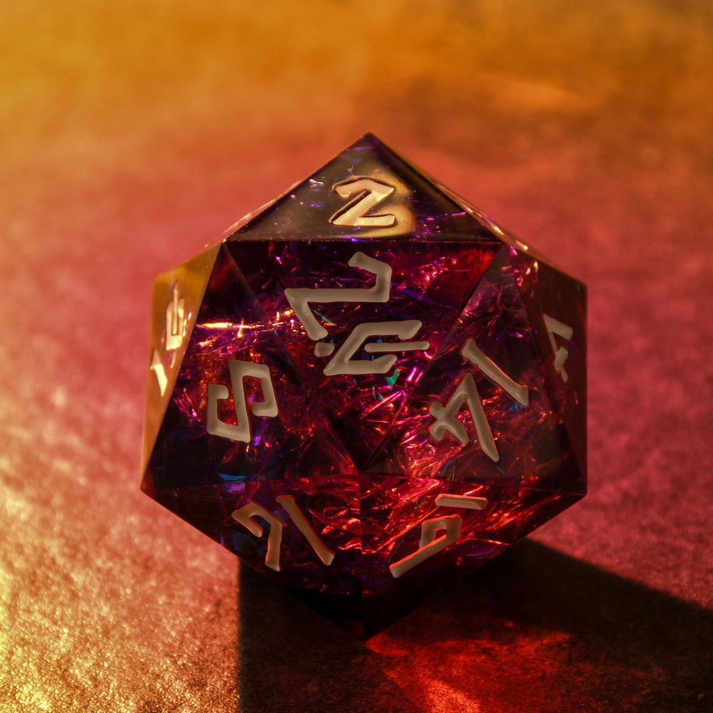 Multicolored d20 die with gold numbers on a dark background