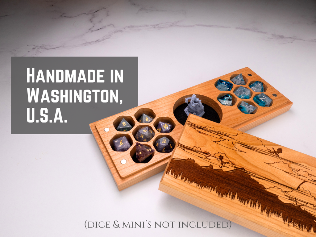 Wooden dice tray with engraved design on a marble surface, labeled 'Handmade in Washington, U.S.A.'