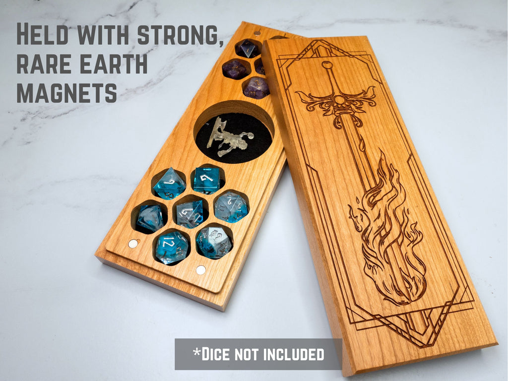 Wooden dice tray with engraved designs on a light background