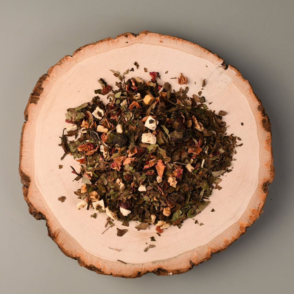 misty mountain gaming loose tea leaves on a wooden tree stump