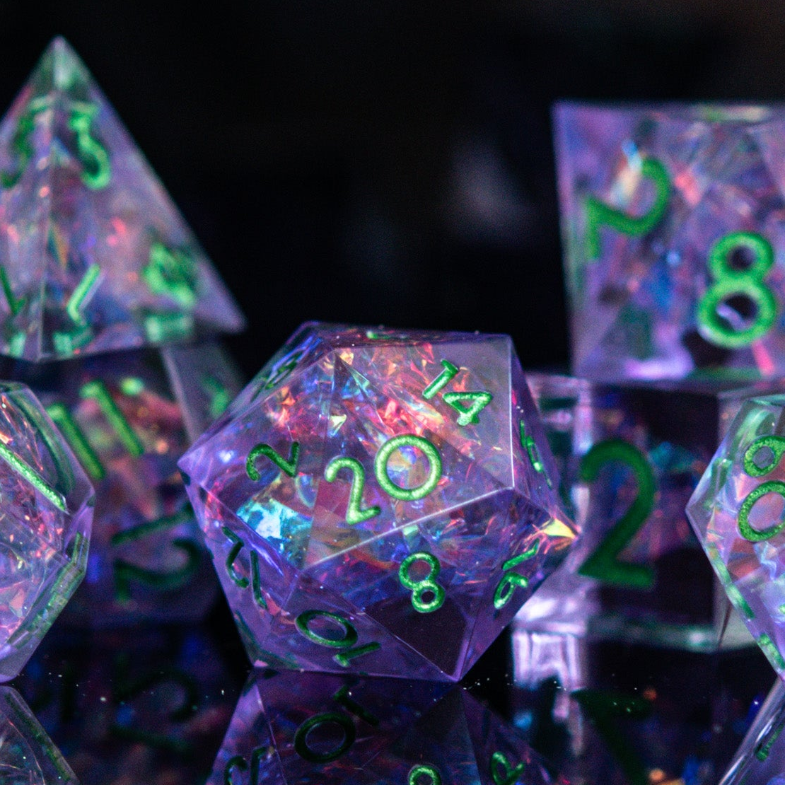 purple clear sharp edge resin dnd dice with colorful iridescent foil inside and green numbering