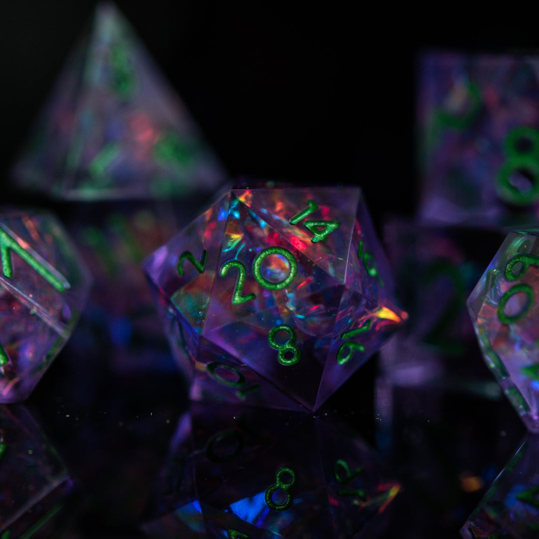 purple clear sharp edge resin dnd dice with colorful iridescent foil inside and green numbering