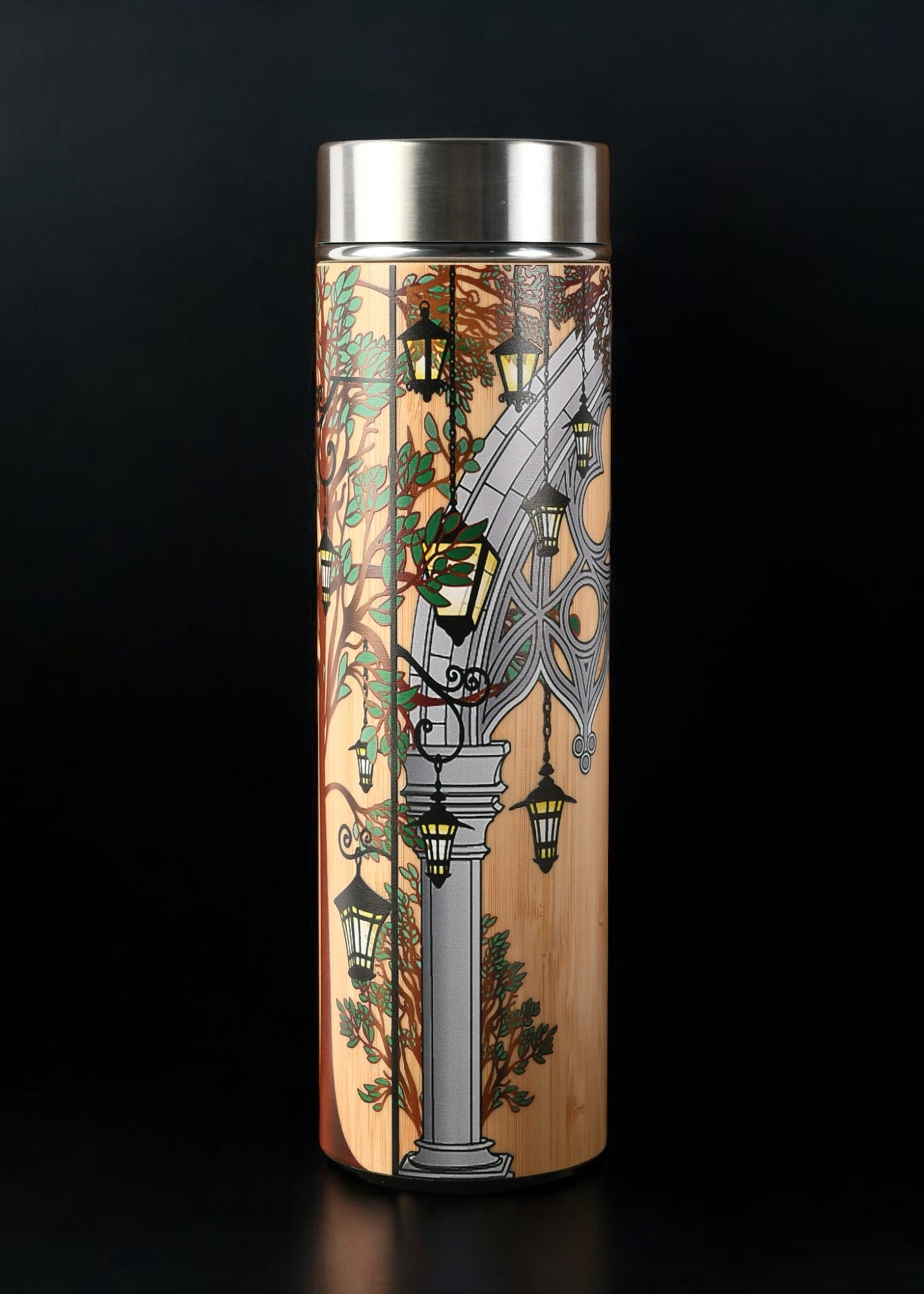 Tumbler with decorative design and metal lid and mesh tea infuser 