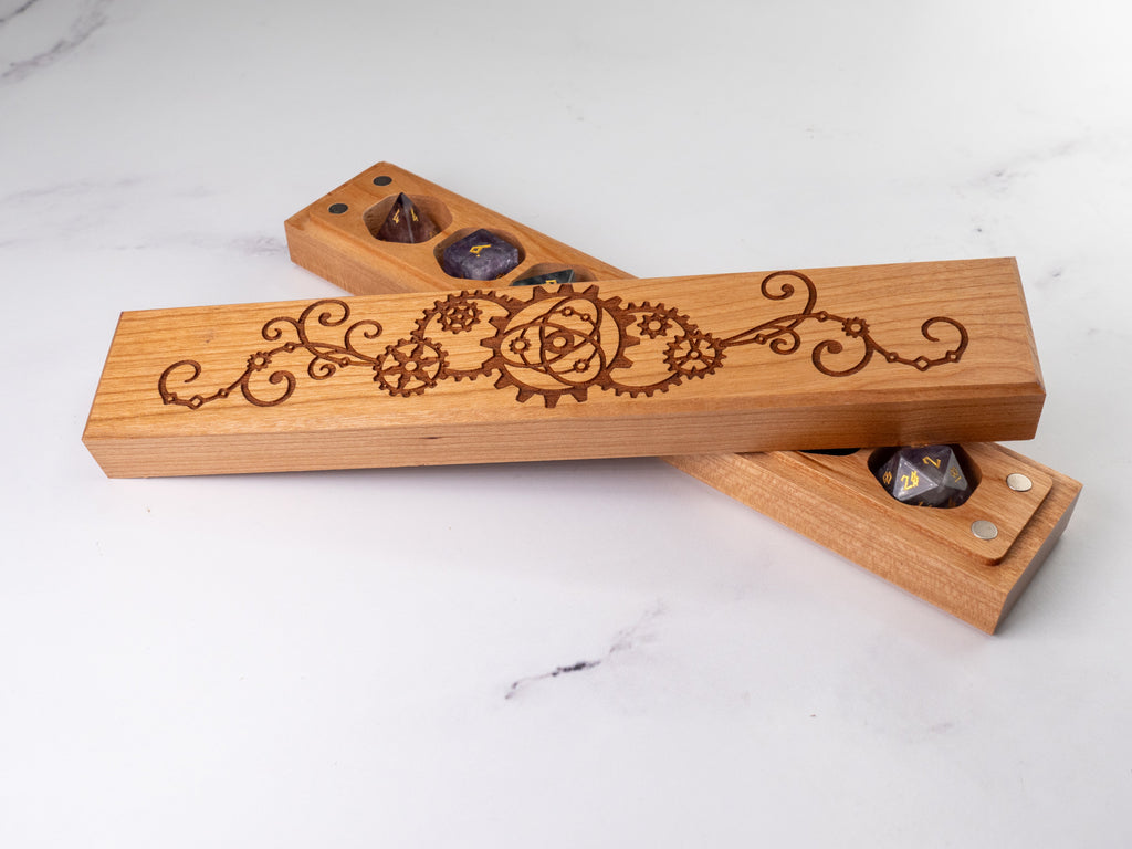 Wooden dice tray with engraved design on a white surface
